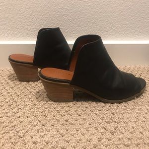 Black leather slides with peep toe